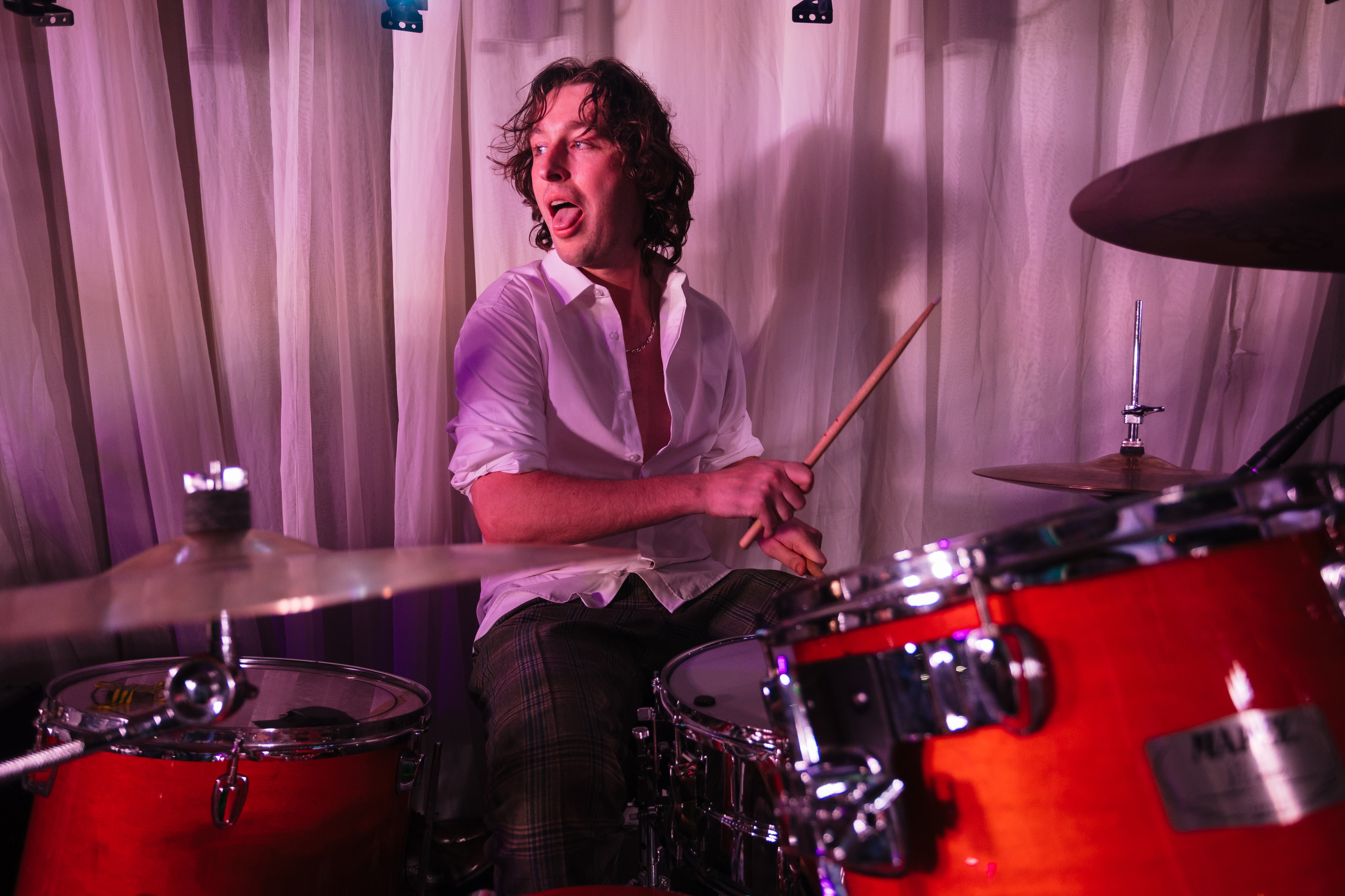 Drummer performing at live event